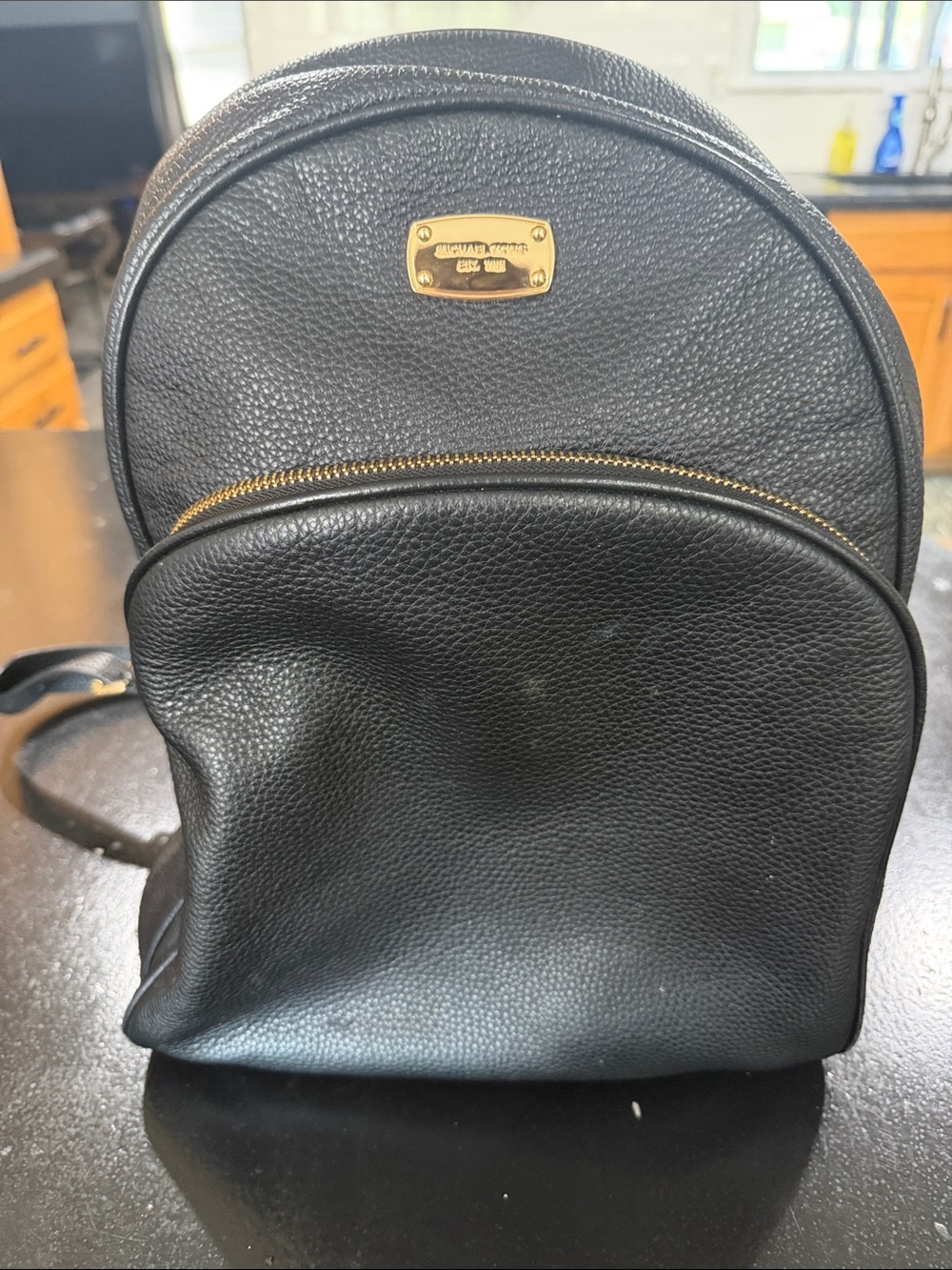 Michael Kors Black Pebbled Leather Mini Backpack with Gold Plaque